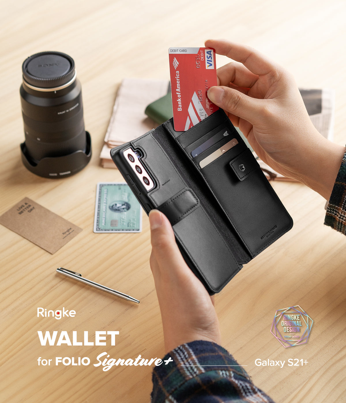 Galaxy S21 Plus Case | Folio Signature+ - Black leather wallet case for Galaxy S21+ holding credit cards on a desk.