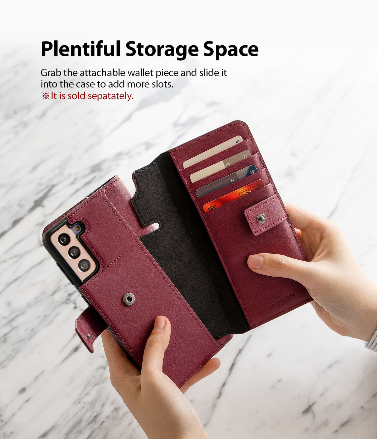 Galaxy S21 Case | Folio Signature+ - Hands holding a burgundy leather phone case with an attached wallet insert holding cards.
