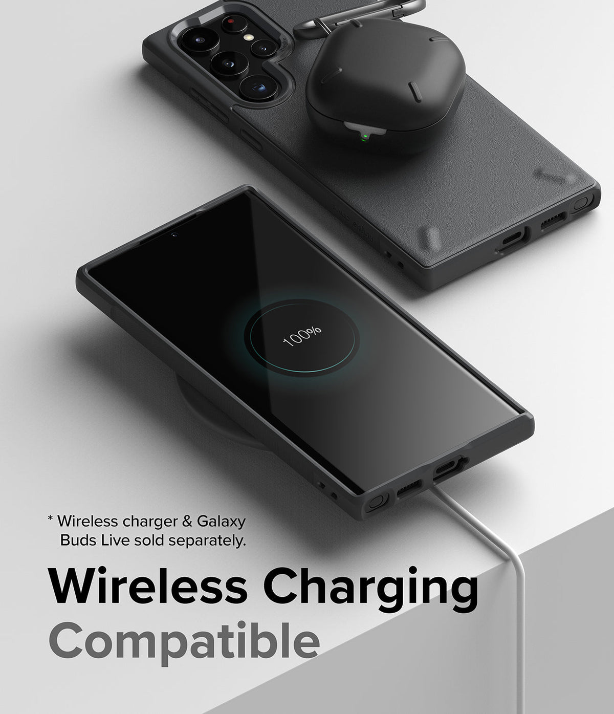 Galaxy S22 Ultra Case Combo | Onyx + Screen Protector - Black phone case on a wireless charger with earbuds on top.