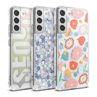Galaxy S22 Case | Fusion Design - Three clear Galaxy S22 cases featuring Seoul text, blue floral, and colorful abstract flower patterns.