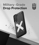 Galaxy S22 Plus Case | Onyx Design - Black phone case with white X graphic and text, floating with debris against grey.