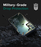 Galaxy S22 Plus Case Combo | Fusion-X Case + Screen Protector + Camera Protector - Galaxy S22 Plus Case Combo - Galaxy S22 Plus in a rugged black and gold case resting on dark, shattered debris.