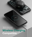 Galaxy S22 Plus Case Combo | Fusion-X Case + Screen Protector + Camera Protector - Galaxy S22 Plus Case Combo - Galaxy S22 Plus in a black Fusion-X case charging wirelessly with earbuds on top.