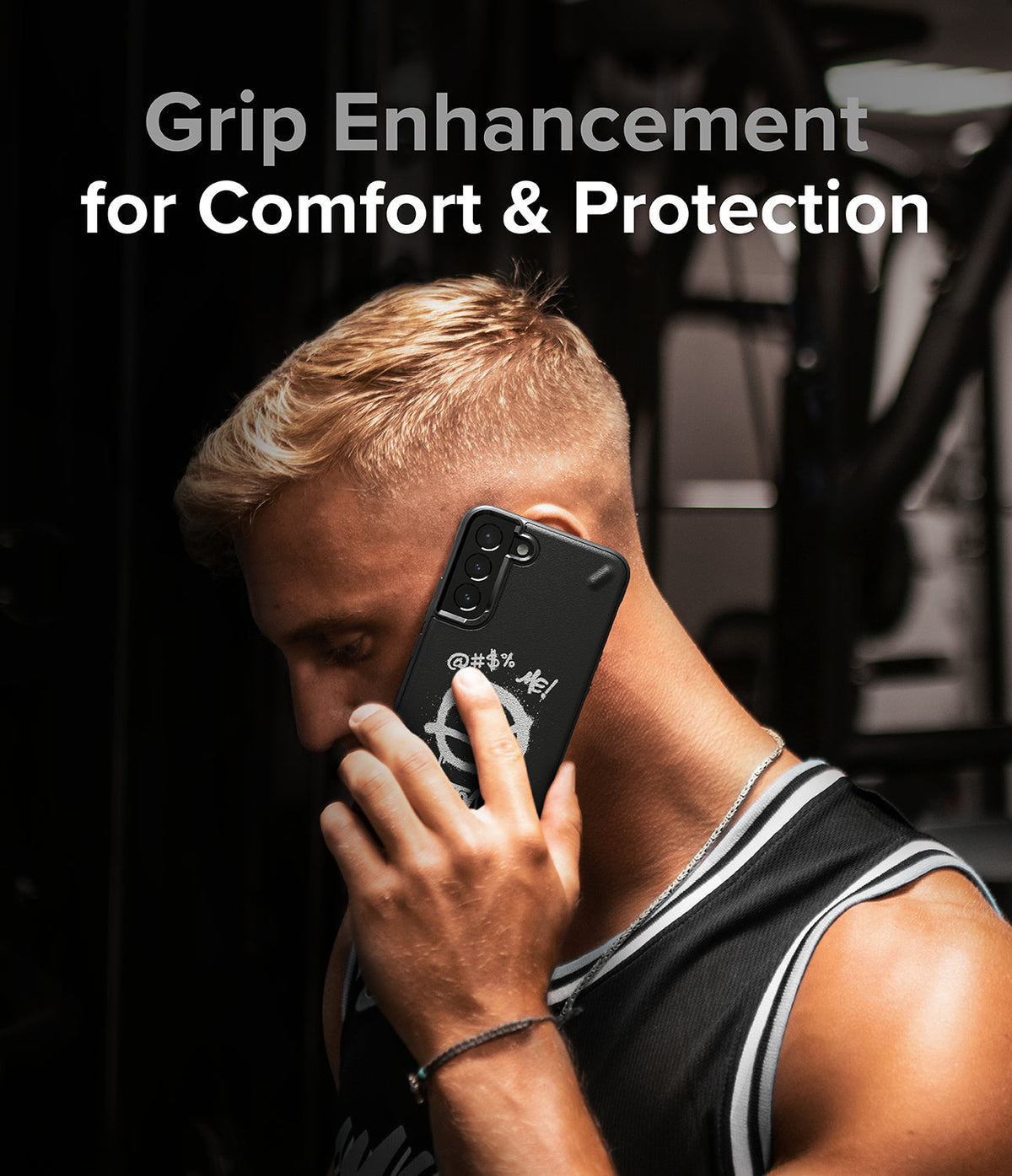 Galaxy S22 Plus Case | Onyx Design - Man holding a black phone case with white graffiti art against his ear.