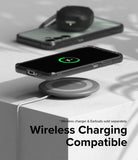 Galaxy S23 FE Case | Fusion - A smartphone in a clear case wirelessly charging on a pad, with earbuds resting on another phone.