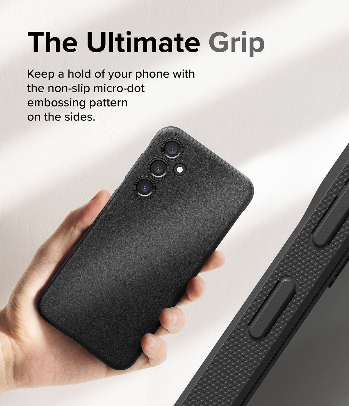 Galaxy S23 FE Case | Onyx - Hand holding a black phone case with a textured micro-dot grip pattern on the side edges.