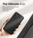 Galaxy S23 FE Case | Onyx - Hand holding a black phone case with a textured micro-dot grip pattern on the side edges.