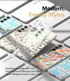 Galaxy S23 Plus Case | Fusion Design - Multiple clear phone cases with vibrant floral and graphic prints arranged on a surface.