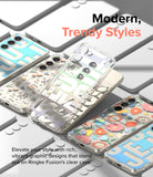 Galaxy S23 Plus Case | Fusion Design - Multiple clear phone cases with vibrant floral and graphic prints arranged on a gray surface.