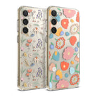 Galaxy S23 Plus Case | Fusion Design - Two clear phone cases with floral patterns, one with small wildflowers and one with large colorful blooms.