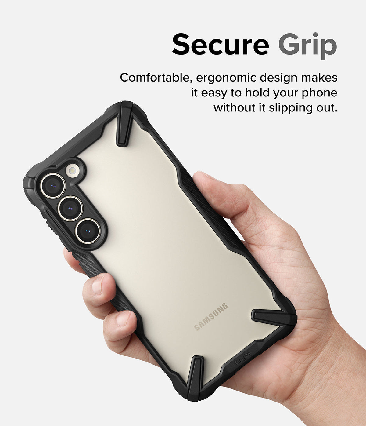 Galaxy S23 Plus Case | Fusion-X - Hand holding a Samsung phone in a black, rugged, clear-backed protective case.