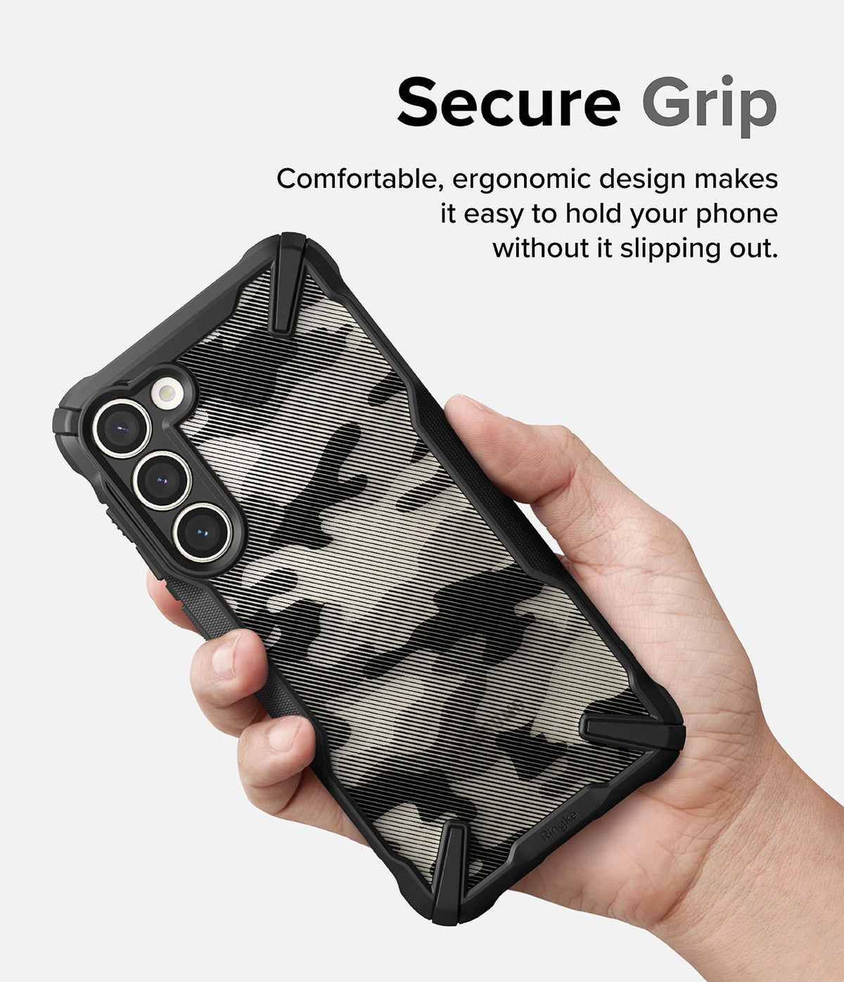 Galaxy S23 Plus Case | Fusion-X - Hand holding a Galaxy S23 Plus in a black camouflage Fusion-X case with a textured, ergonomic grip.