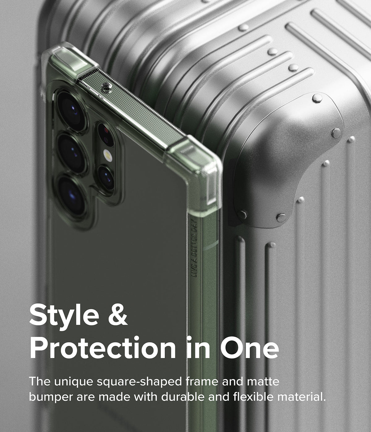 Galaxy S23 Ultra Case | Fusion Bumper - A clear phone case with a green bumper resting against a metallic suitcase.