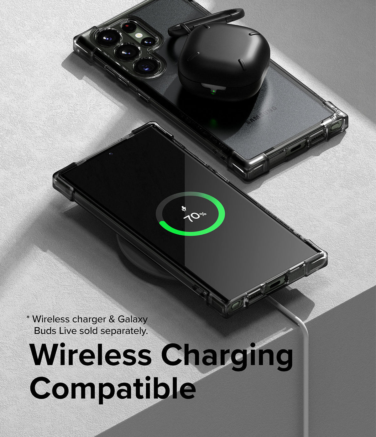 Galaxy S23 Ultra Case | Fusion Bumper - A phone in a clear case wirelessly charging with earbuds resting on top.