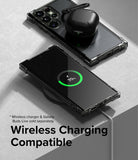 Galaxy S23 Ultra Case | Fusion Bumper - A phone in a clear case wirelessly charging with earbuds resting on top.