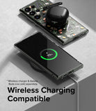 Galaxy S23 Ultra Case | Fusion Design - Floral case on a phone charging wirelessly with earbuds on top.