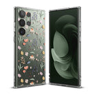 Galaxy S23 Ultra Case | Fusion Design - Clear phone case with colorful floral pattern on a green Galaxy S23 Ultra.