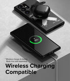 Galaxy S23 Ultra Case | Onyx Design - Black phone case with white X graphic charging wirelessly with earbuds on top.