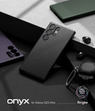Galaxy S23 Ultra Case | Onyx - Black textured phone case for Galaxy S23 Ultra on a geometric surface with accessories.