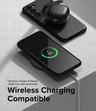 Galaxy S23 Case | Onyx - Black phone in Onyx case wirelessly charging with earbuds case resting on top.