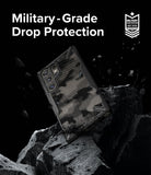 Galaxy S24 Ultra Case | Fusion-X - Camo phone case floating above jagged rocks with military-grade drop protection text.