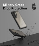 Galaxy S24 Ultra Case | Fusion Bold - A phone in a protective case hitting a cracked surface with debris flying.