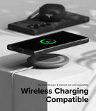 Galaxy S24 Ultra Case | Onyx Design - Black phone in textured case wirelessly charging on a circular pad with earbuds nearby.