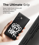 Galaxy S24 Ultra Case | Onyx Design - Hand holding a black phone case with white graffiti art and side micro-dot grip.