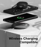Galaxy S24 Ultra Case | Onyx Design - Black phone in Onyx case wirelessly charging on a circular pad with earbuds nearby.