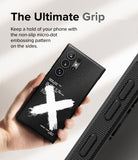 Galaxy S24 Ultra Case | Onyx Design - Hand holding black phone case with white X graphic and micro-dot side texture.