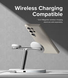 Galaxy S24 Ultra Case | Silicone Magnetic - Beige phone case attached to a chrome 3-in-1 magnetic wireless charger.