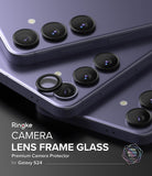 Galaxy S24 Lens Protector | Camera Lens Frame Glass - Galaxy S24 Lens Protector - Black glass lens covers being applied to the triple camera array of a purple Galaxy S24.
