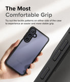 Galaxy S24 Case | Fusion Bold - Hand holding a phone in a black case with textured side grips for a stable hold.