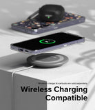 Galaxy S24 Case | Fusion Design - A Galaxy S24 in a clear case wirelessly charging on a pad with earbuds in the background.