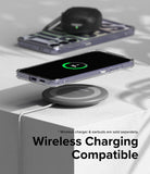 Galaxy S24 Case | Fusion Design - Galaxy S24 in a clear case wirelessly charging on a pad with earbuds in the background.