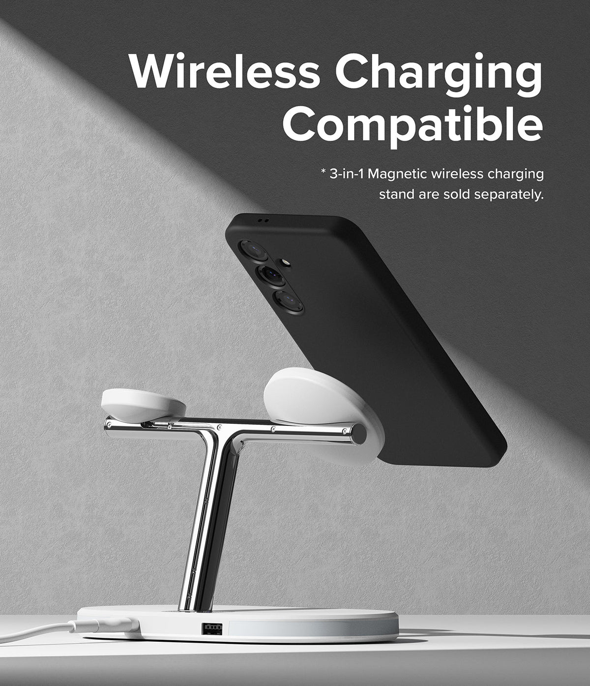 Galaxy S24 Case | Silicone Magnetic - Black phone case on a magnetic wireless charging stand against a gray background.