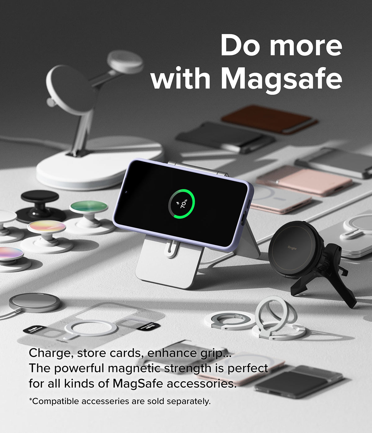Galaxy S24 Case | Silicone Magnetic - Galaxy S24 in a lavender case charging on a stand surrounded by various MagSafe accessories.