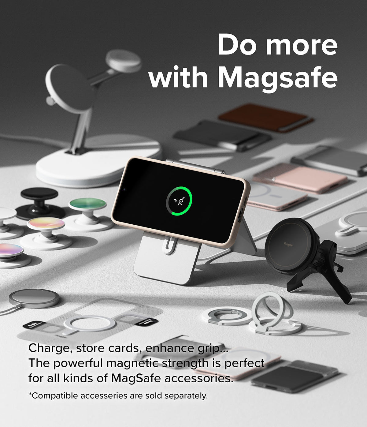 Galaxy S24 Case | Silicone Magnetic - Phone in a magnetic case charging on a stand surrounded by various MagSafe accessories.