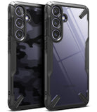 Galaxy S24 Case | Fusion-X - Two Galaxy S24 phones in black Fusion-X cases, one with a camo pattern and one clear, showing camera lenses.