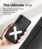 Galaxy S24 Case | Onyx Design - Hand holding a black phone case with a white X graphic and micro-dot side grip texture.