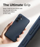 Galaxy S24 Case | Onyx - Hand holding a textured navy phone case with a micro-dot grip pattern on the side buttons.