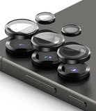 Galaxy S25 Ultra | Camera Lens Frame Glass - Galaxy S25 Ultra | Black metal camera lens protectors hovering above the smartphone's rear camera array.