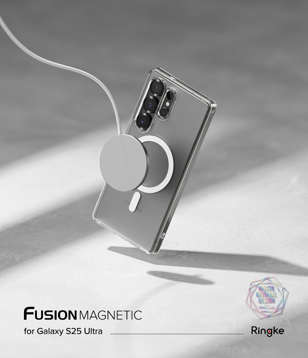 Galaxy S25 Ultra Case | Fusion Magnetic Matte - A matte clear phone case with a magnetic ring charging on a grey surface.