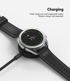 Galaxy Watch 3 (41mm) | Bezel Styling - Silver Galaxy Watch 3 with bezel styling charging wirelessly on a black dock.