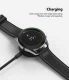 Galaxy Watch 3 (45mm) | Bezel Styling - A Galaxy Watch 3 with a bezel accessory charging wirelessly on a magnetic dock.