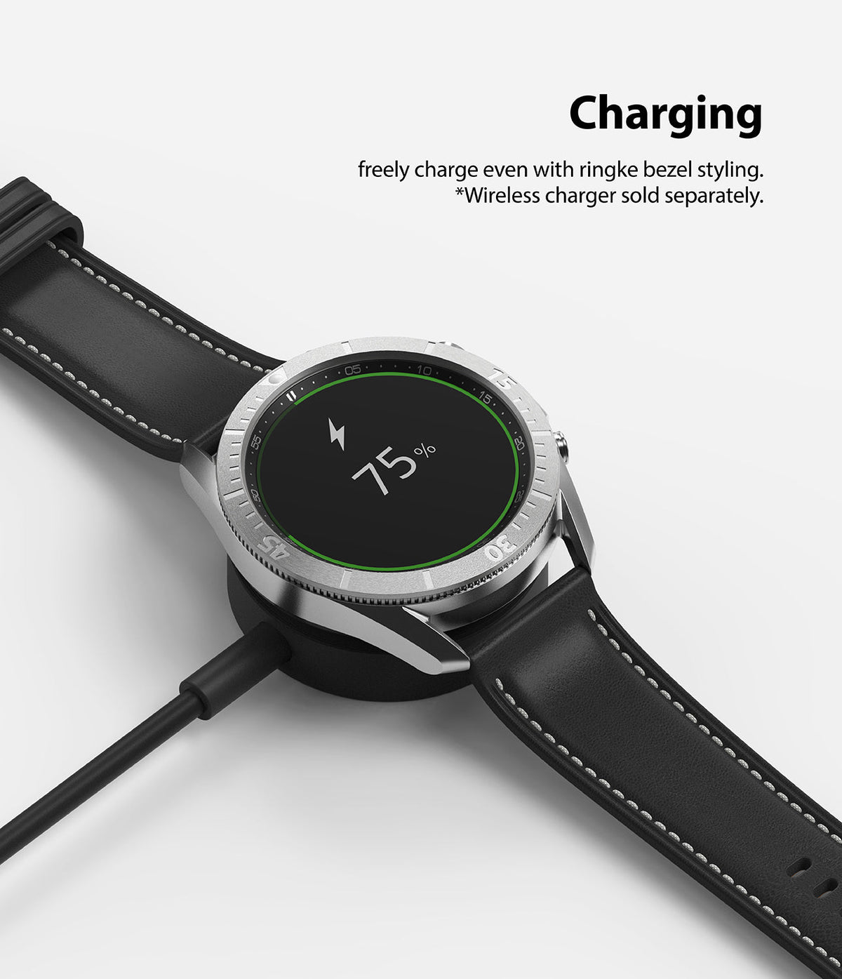 Galaxy Watch 3 (45mm) | Bezel Styling - Smartwatch with silver bezel accessory charging on a wireless dock at 75%.