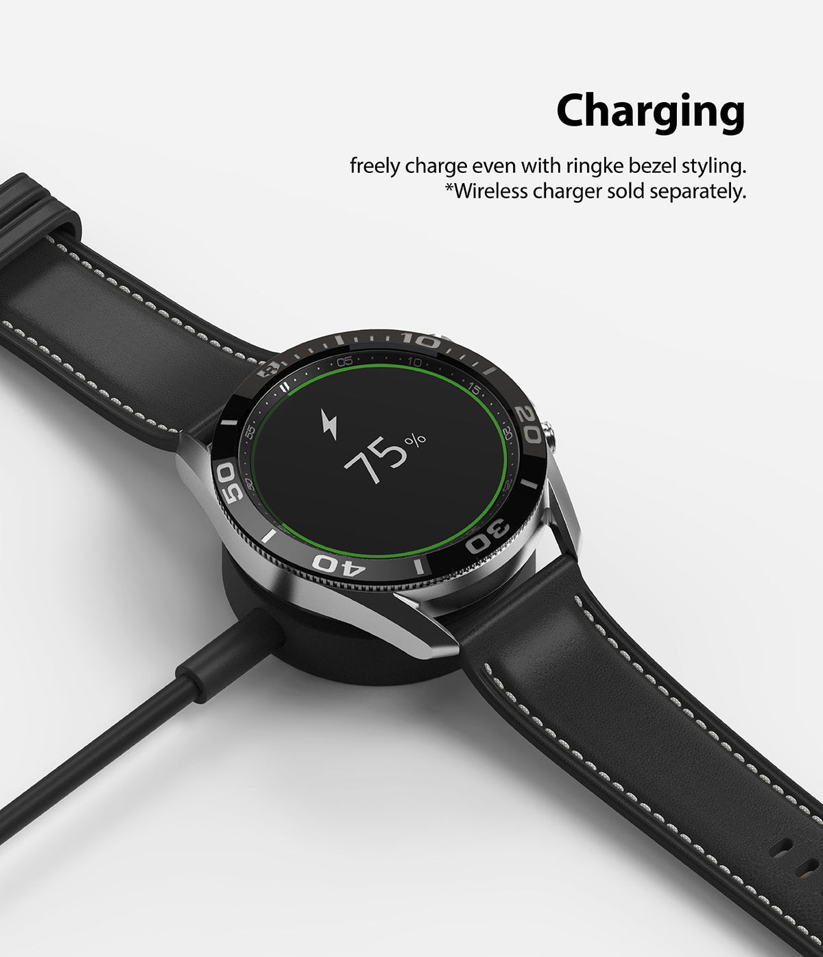 Galaxy Watch 3 (45mm) | Bezel Styling - A Galaxy Watch 3 with a black bezel accessory charging on a wireless dock.