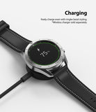 Galaxy Watch 3 (45mm) | Bezel Styling - Silver smartwatch with black leather strap charging on a wireless dock.