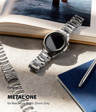 Watch Lug 20mm | Metal One Band - Silver metal watch band with a smartwatch on a textured desk next to a notebook and pen.