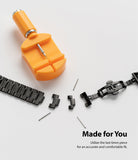 Watch Lug 22mm | Metal One Band [Black] - A black metal watch band being resized with an orange link removal tool.
